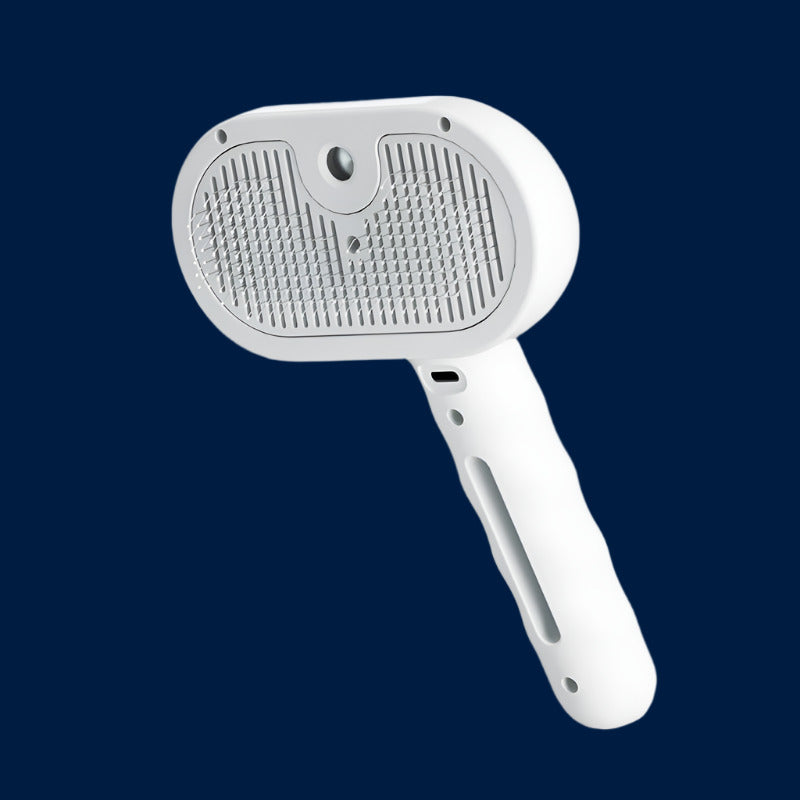 White pet grooming brush on a white background